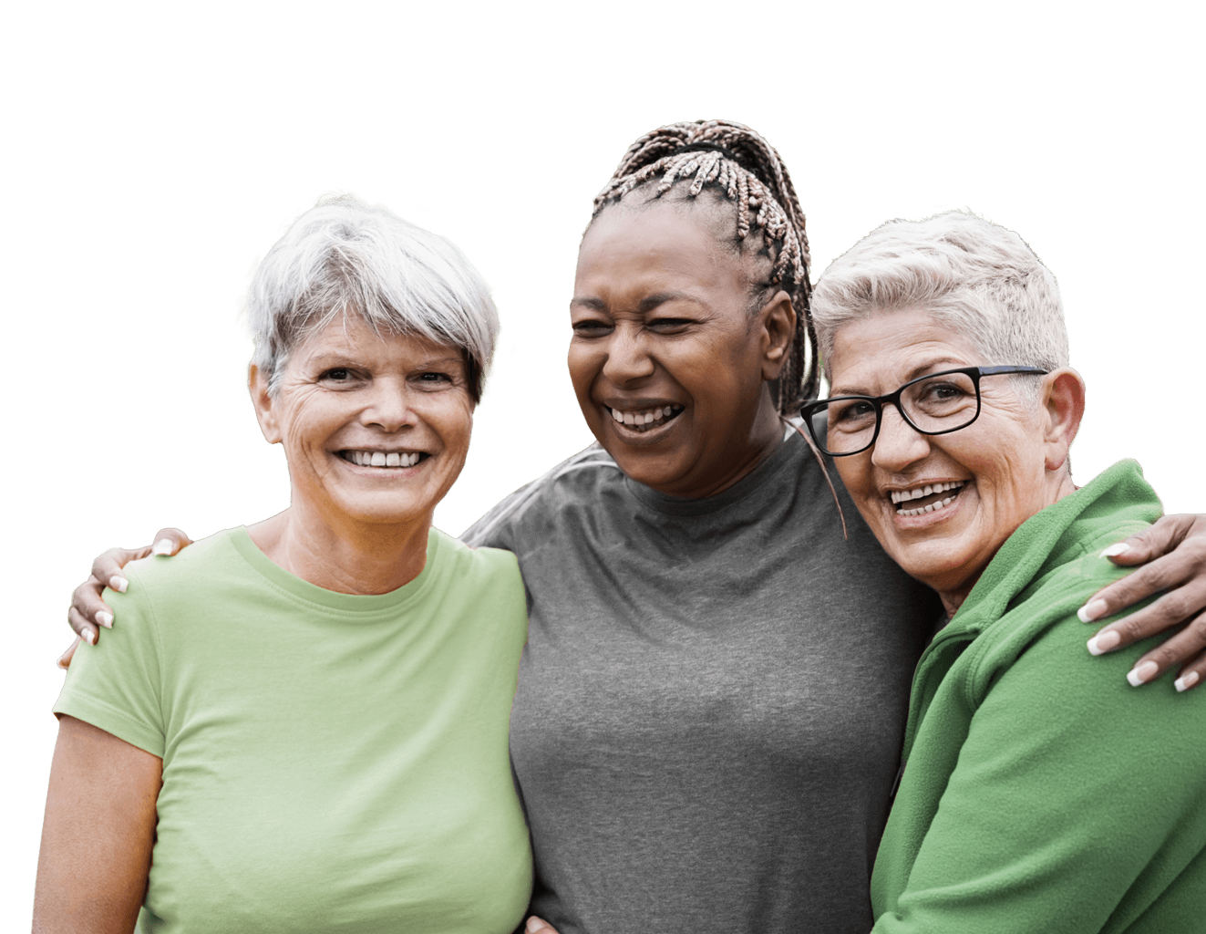 Three older female friends laughing with their arms around each other.